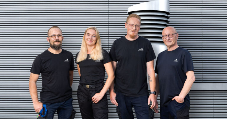 Das Team von Hansen Fire Solutions, 4 Personen nebeneinander